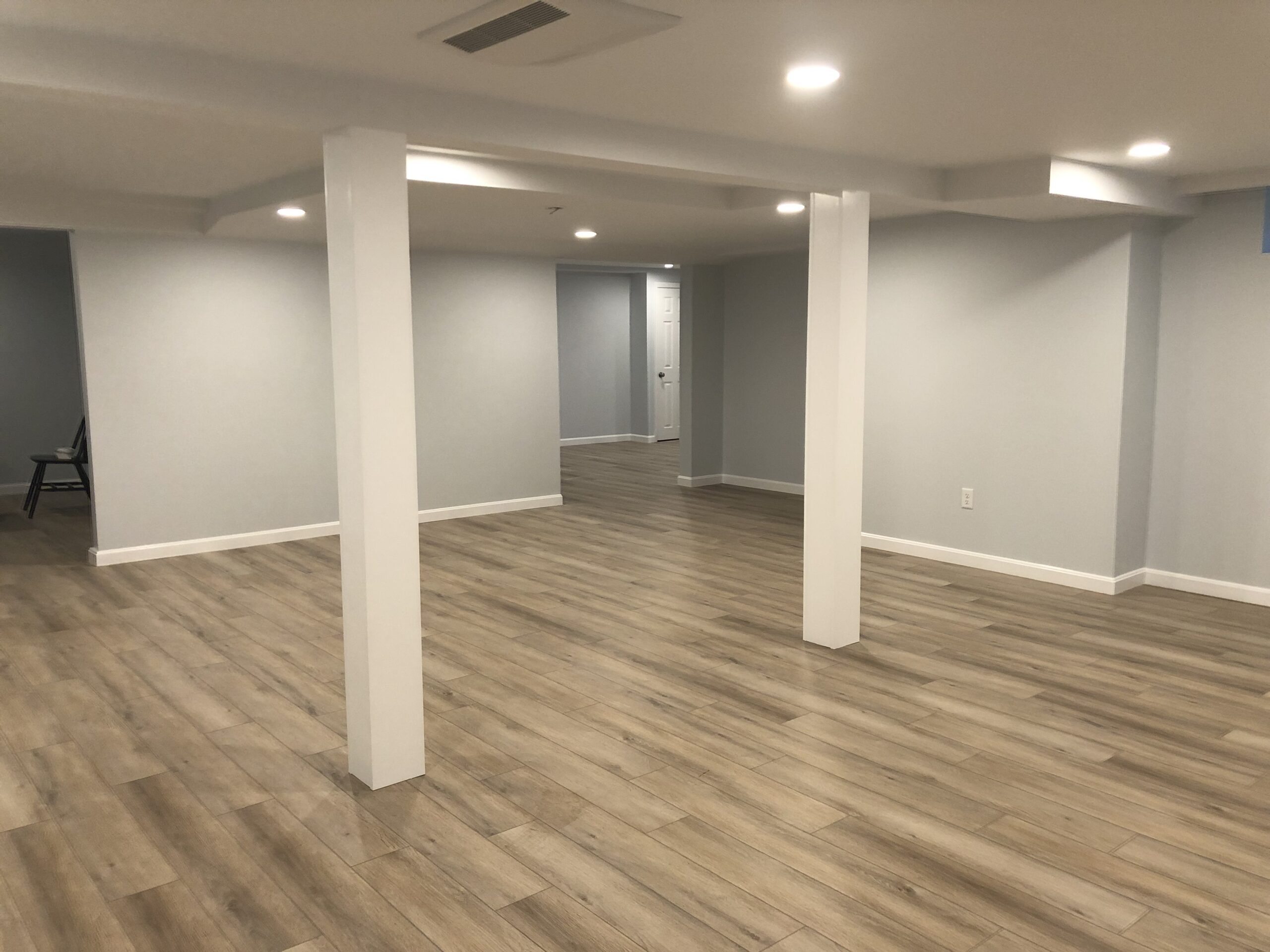 Basement remodeling project detail by Custom Crafted Homes