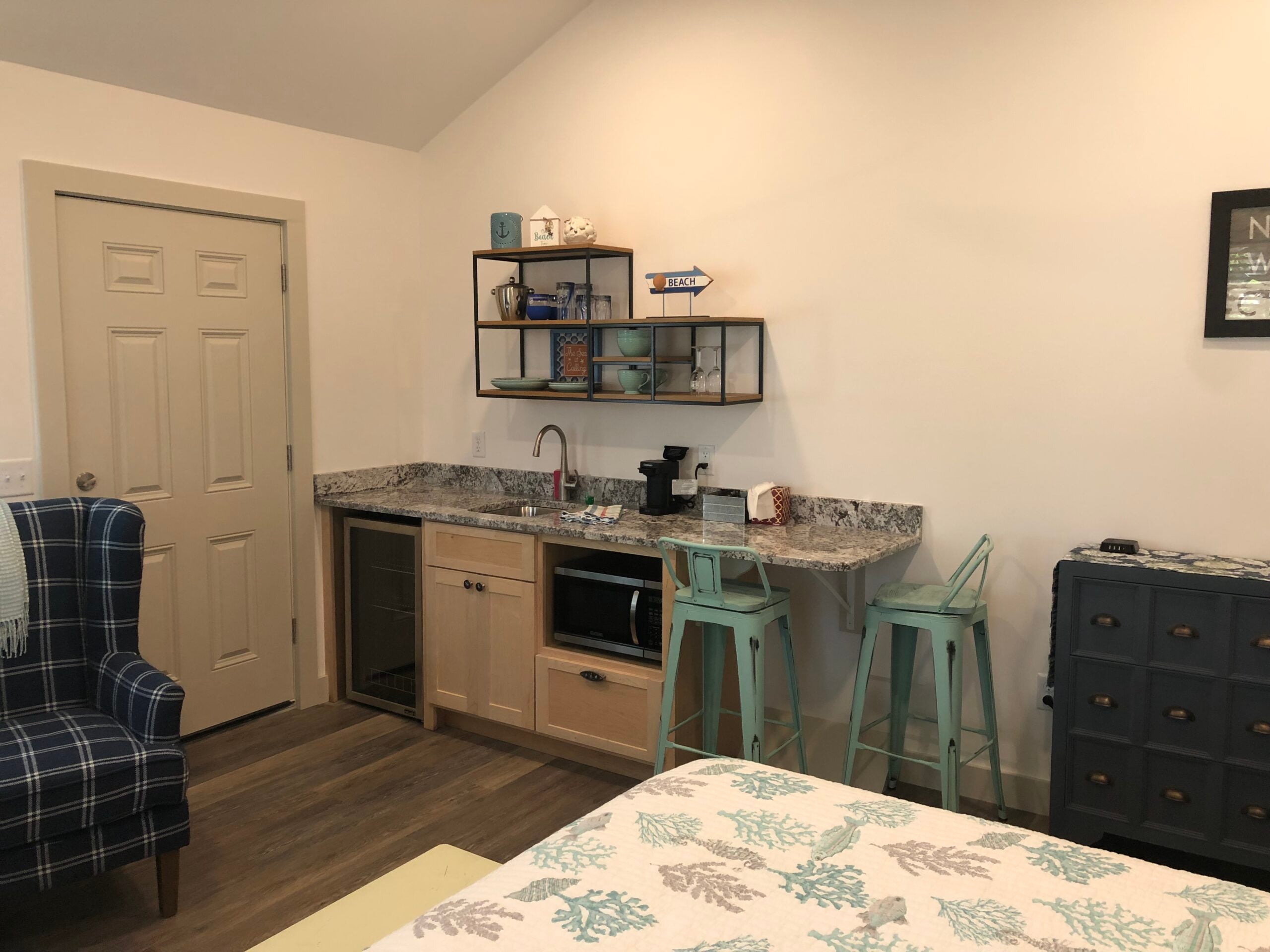 Kitchen island with seating by Custom Crafted Homes