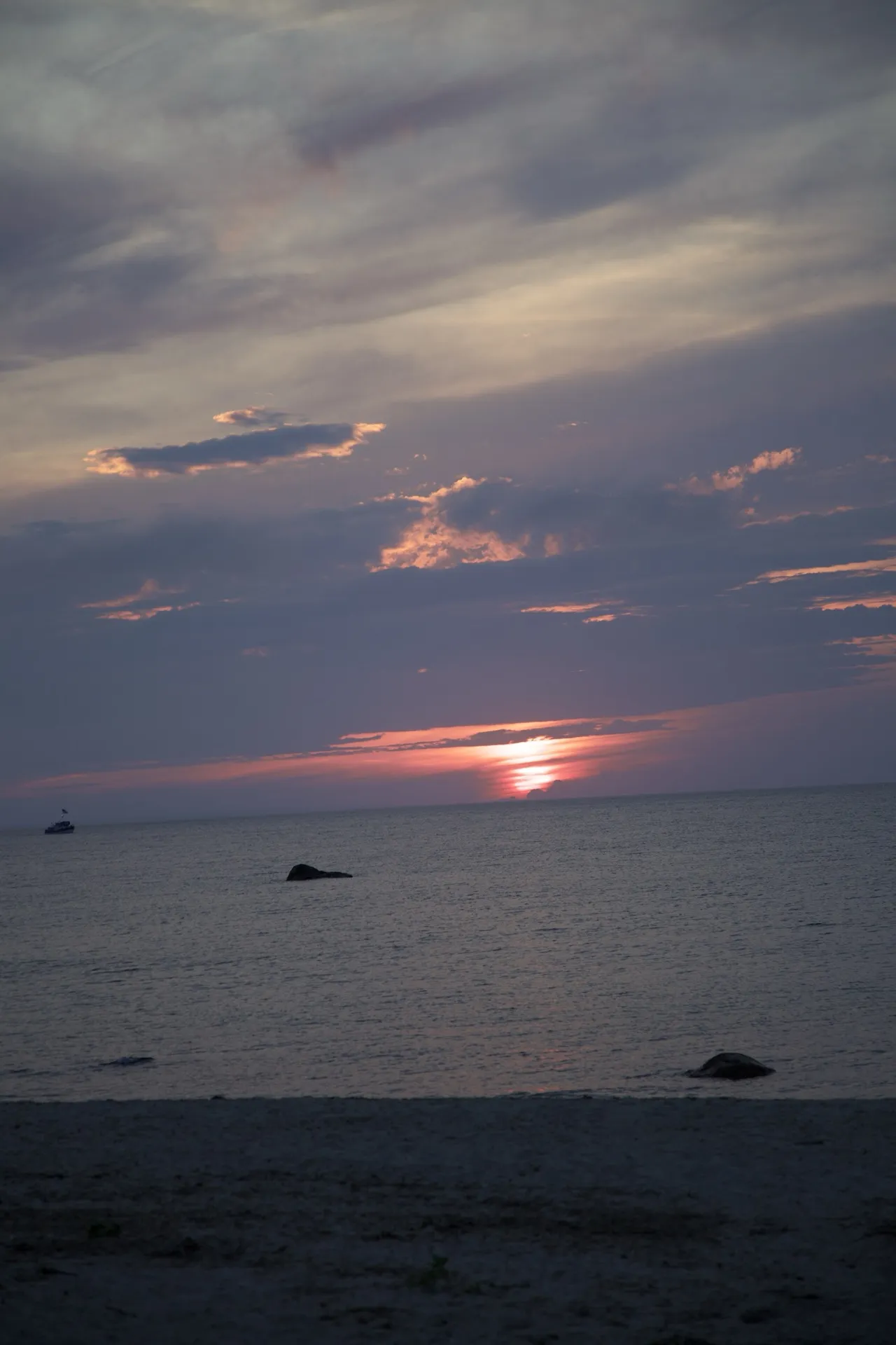 Sunset over Nantucket Sound from a Dennis Port beach.