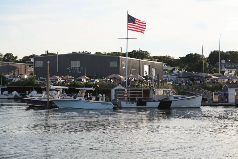 American flag over Northside Marina at Sesuit Harbor in East Dennis, Massachusetts.